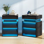 Sikaic Nightstand LED Nightstand with Charging Station and Sliding Top Black Black / Engineered Wood / Modern